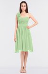 ColsBM Mina Sage Green Romantic A-line Asymmetric Neckline Sleeveless Knee Length Bridesmaid Dresses