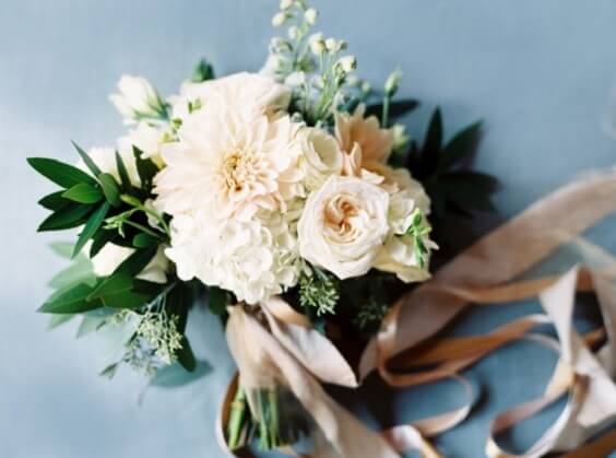 soft yellow bouquets for fall sky blue wedding