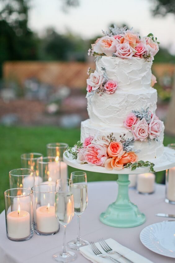 wedding cake and candles for 2019 spring coral wedding