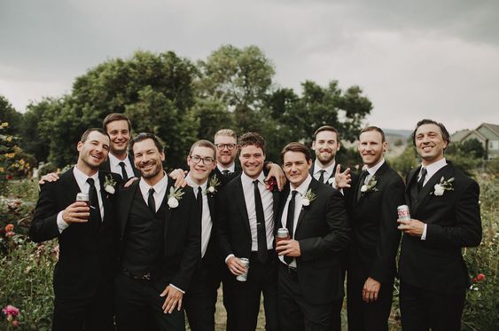 Black groom and groomsmen for green, black and gold wedding