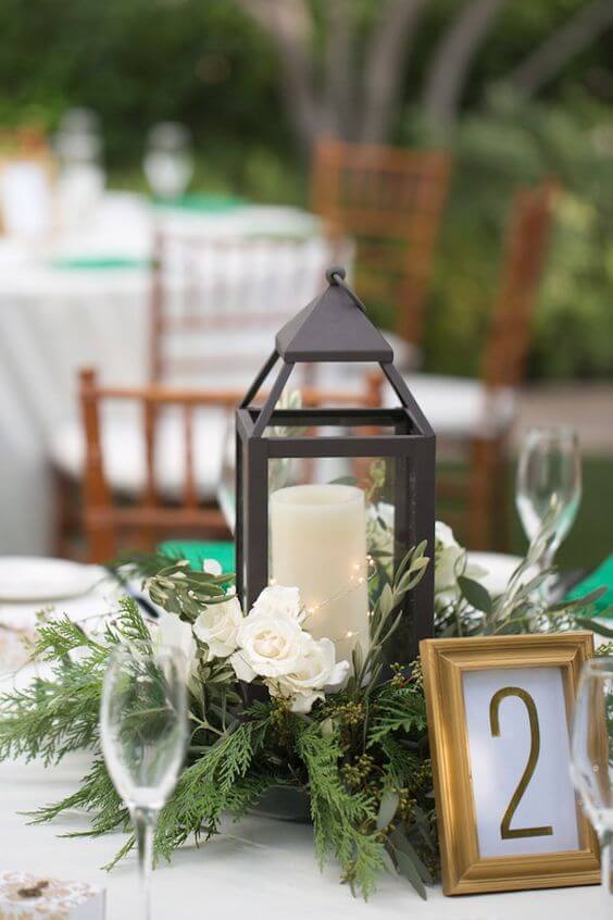 wedding table decoration for green, black and gold wedding