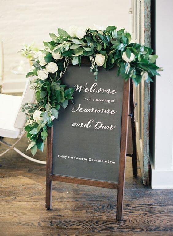 wedding welcome board for green, black and gold wedding