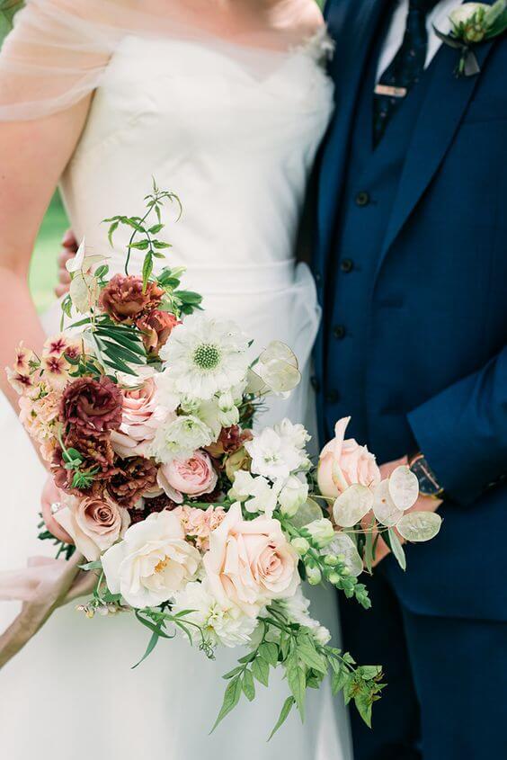 Bride and groom for Dusty rose wedding