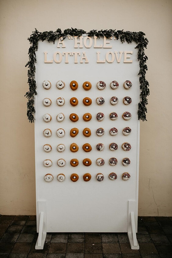 tri-flavored doughnut wall for bohemian sage green black and brown fall wedding