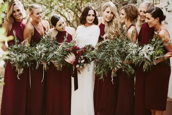 Burgundy bridesmaids for burgundy and green wedding