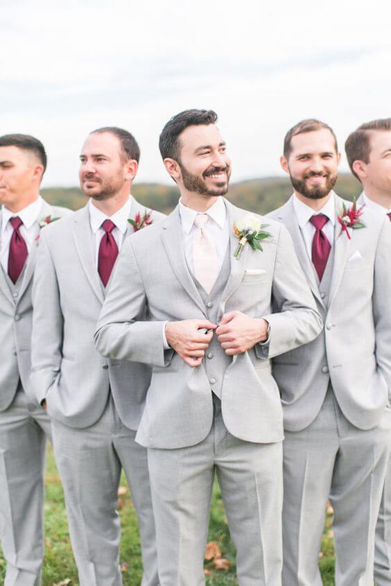 Grey groom and groommen for burgundy and ivory wedding