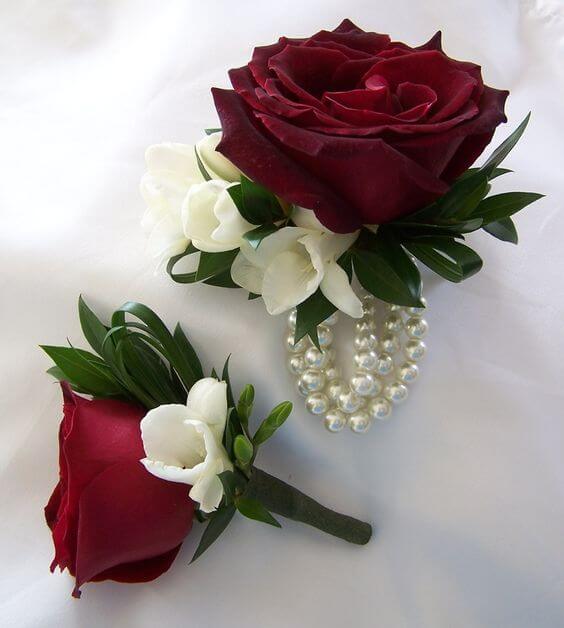 Wedding boutonniere for burgundy and ivory wedding