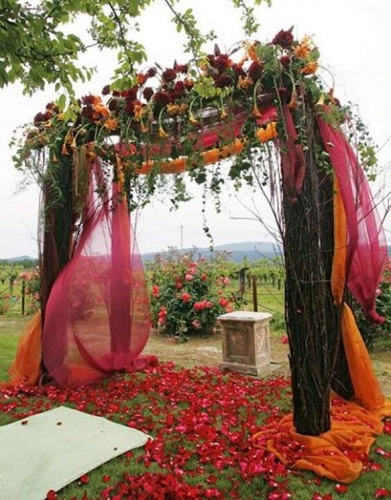 Wedding arch for burgundy and orange wedding