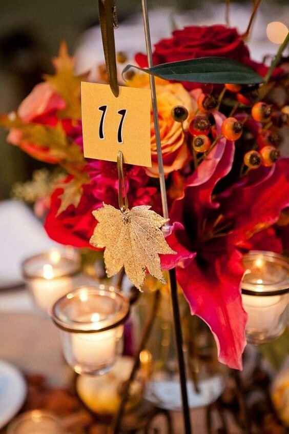 Wedding table decorations for burgundy and orange wedding
