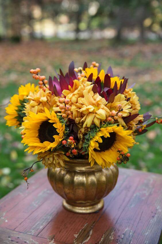 Wedding centerpieces for burgundy and Yellow wedding