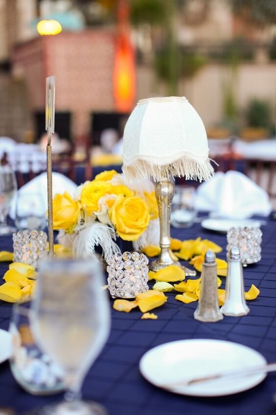 yellow flowers centerpieces for summer blue wedding