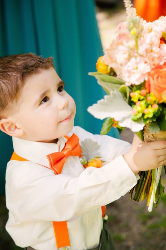 ring bearer with tangerine bouquets for summer teal blue wedding