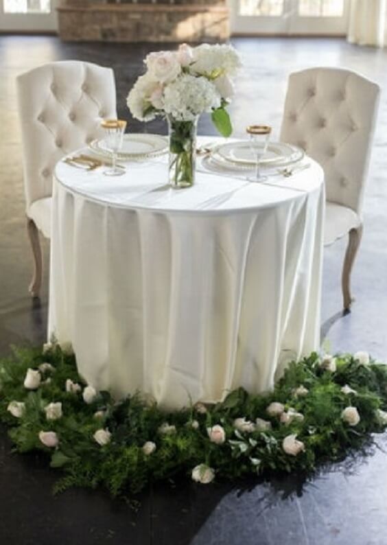 Table decorations for Champagne and Green May Wedding