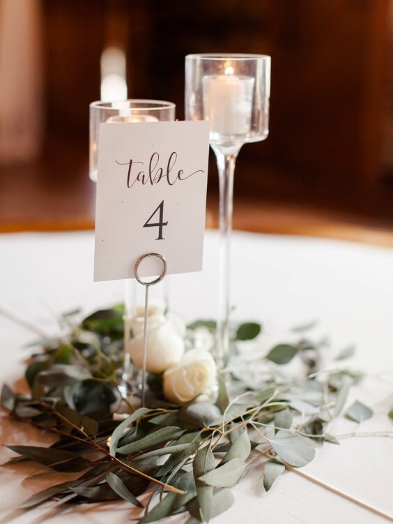 Table Decorations for Dusty blue and greenery May Wedding
