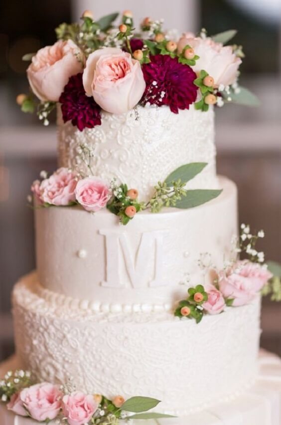 white wedding cake with blush flowers for september burgundy and blush wedding 2019