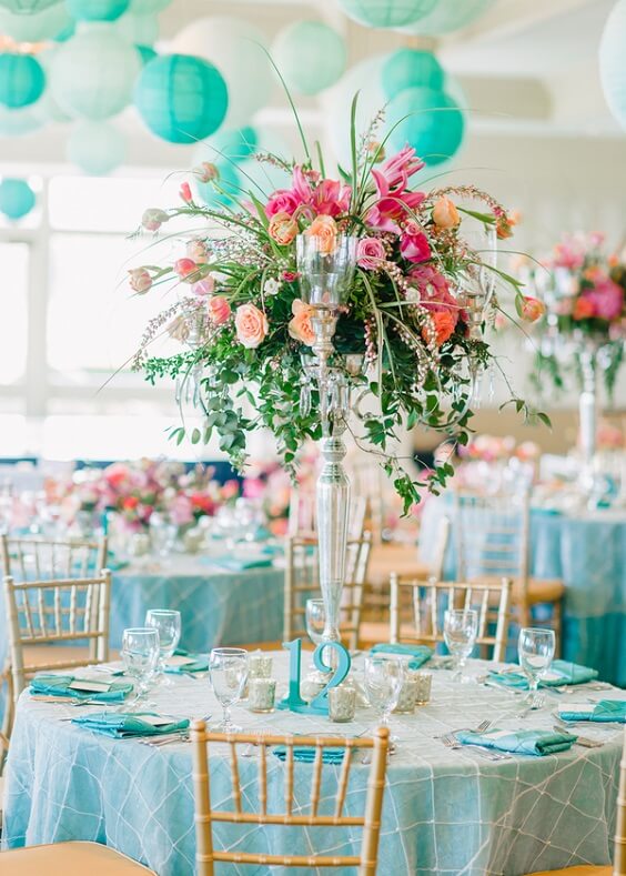 aqua tablecloth and centerpiece for july aqua and coral wedding 2019
