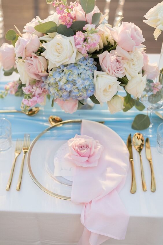 blue table runner and pink centerpiece for july light pink and blue wedding 2019