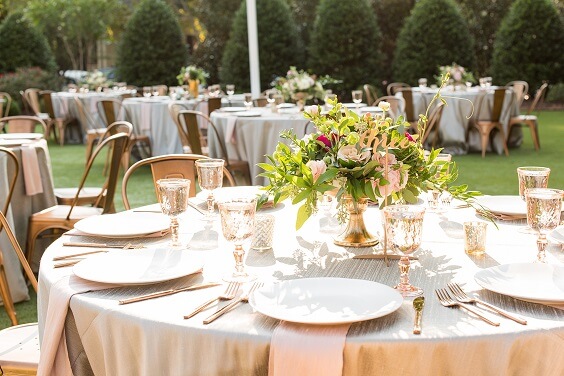 Table decorations for Hot Pink and Blush June Wedding