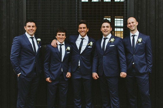 Navy blue suits for White and Green June Wedding