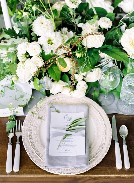 Table decorations for Silver grey and white June Wedding