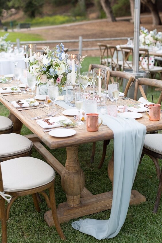Table decorations for Ice Blue and blush June Wedding
