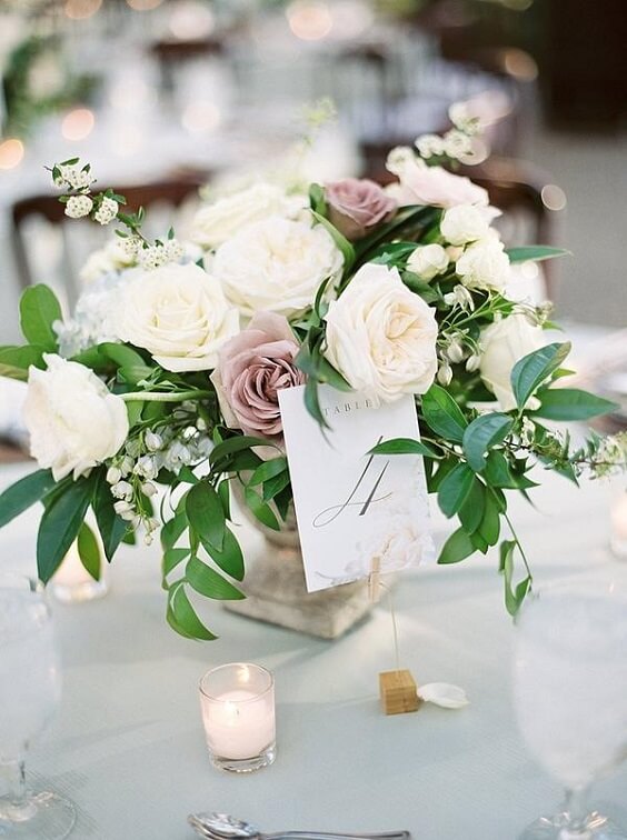 Wedding centerpieces for dusty rose and grey June wedding