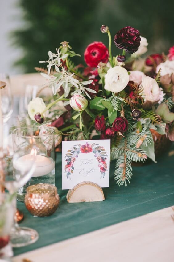 table card and centerpieces for november emerald green and burgundy wedding 2019