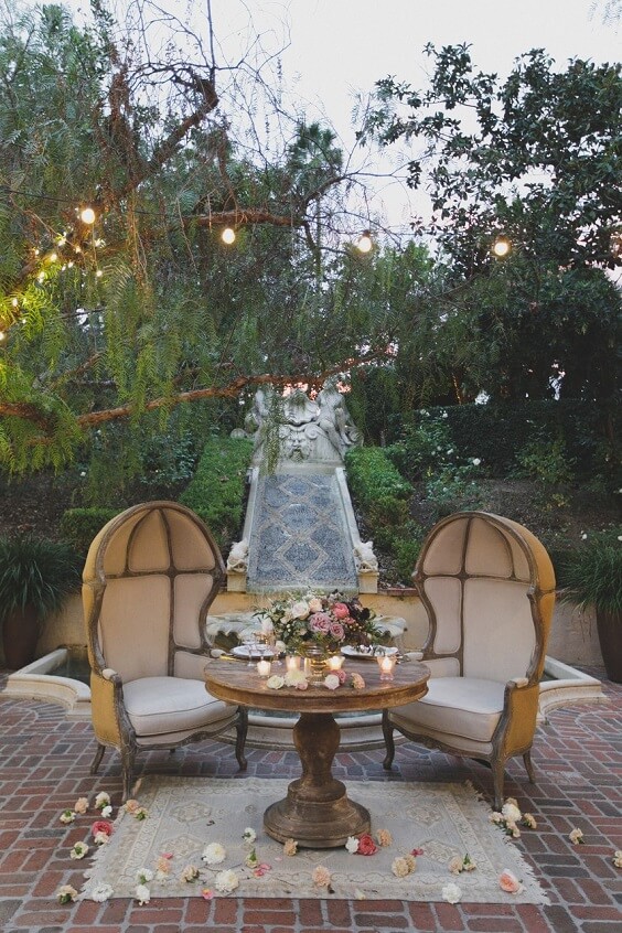 chairs table and flowers for november black and blush wedding 2019