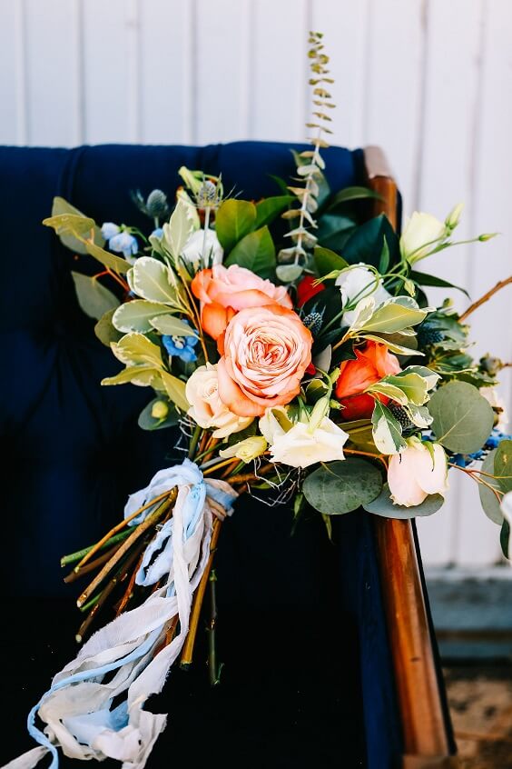 chair and bouquet for october blue and tangerine wedding 2019