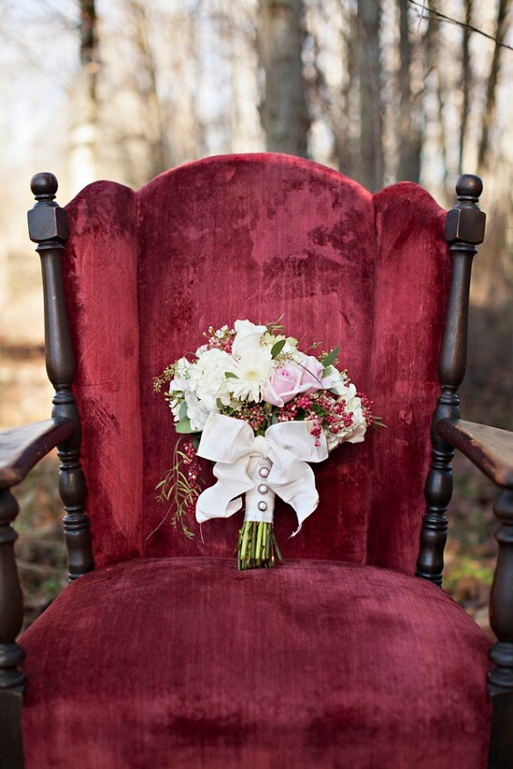 chair and bouquet for october wine and gold wedding 2019