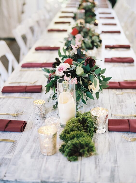 Table decorations for burgundy and blush winter wedding
