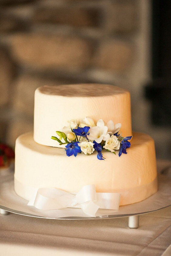 Wedding cake for royal blue and pink winter wedding