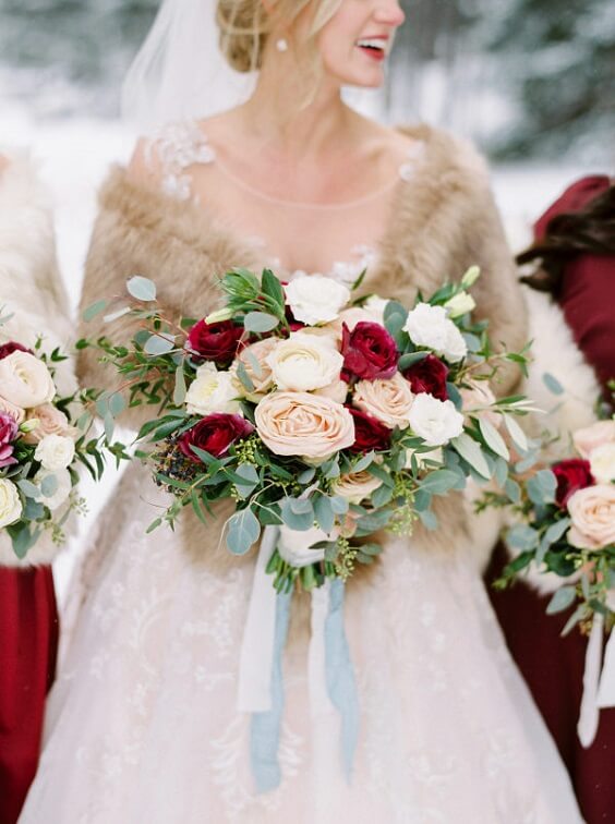 Bridal bouquets for dark red and pink winter wedding