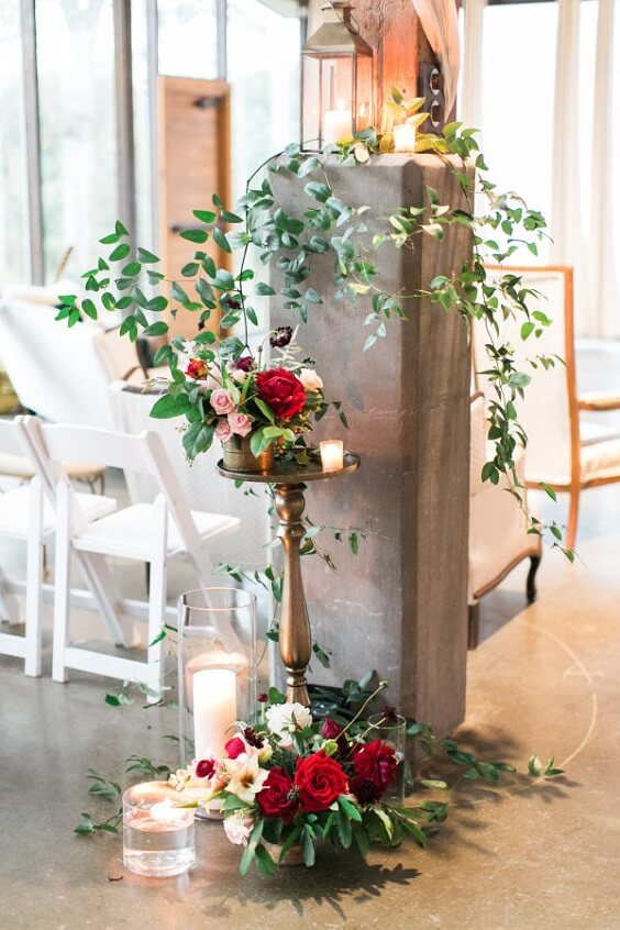 Flower decorations for dark red and pink winter wedding