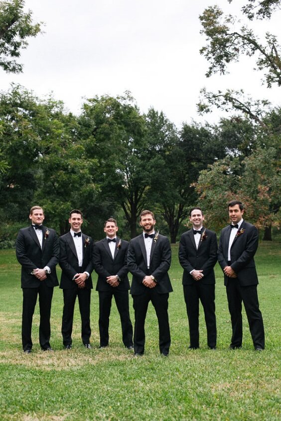 Groom and groomsmen suits for champagne and burgundy winter wedding