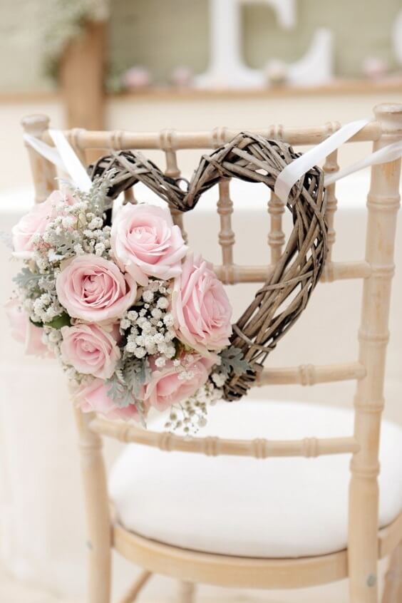 chair with blush flowers for spring wedding blush and grey 2020