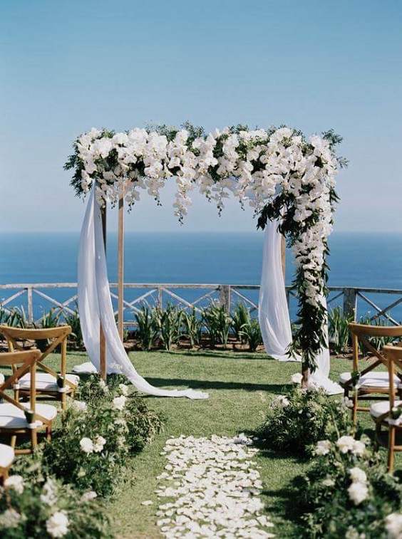 Wedding arch for white and greenery summer wedding