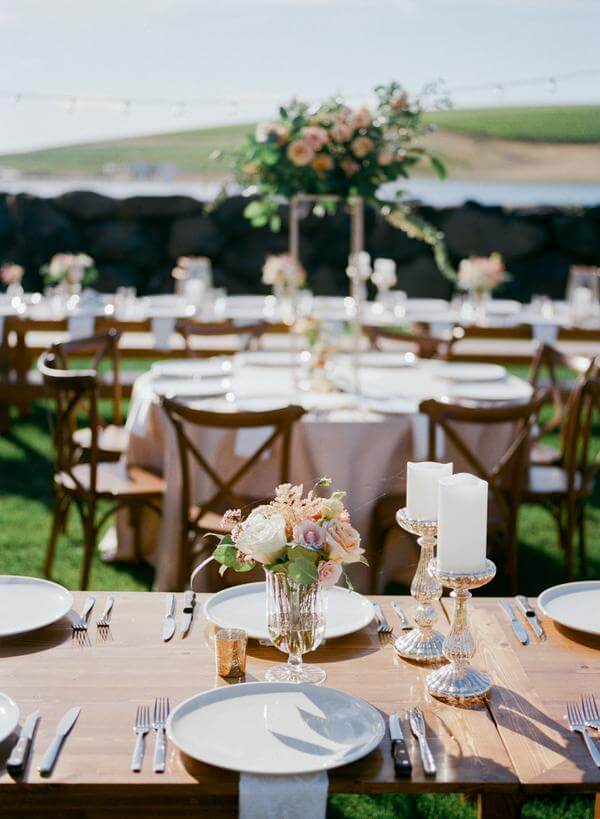 Table decorations for dusty rose and black summer wedding