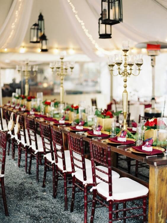 Table decorations for burgundy and navy blue winter wedding