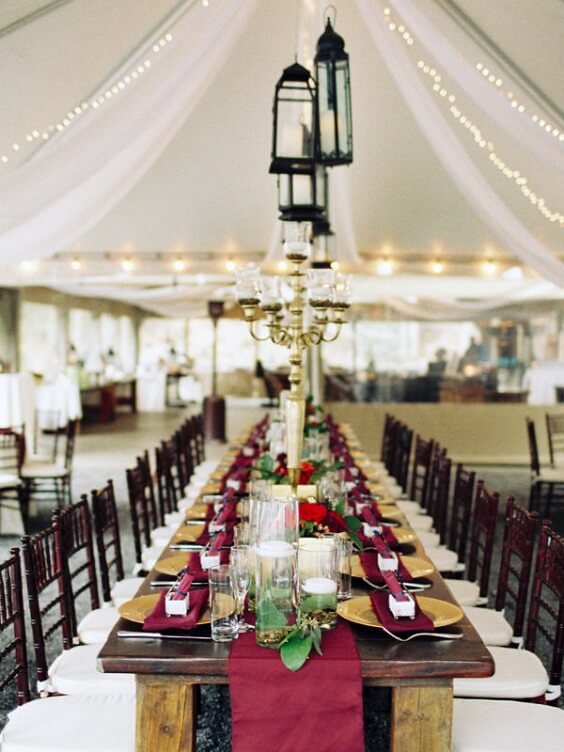 Table decorations for burgundy and navy blue winter wedding