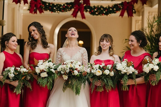 Red bridesmaid dresses for red and green winter wedding