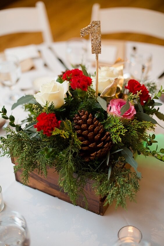 Wedding centerpieces for red and green winter wedding