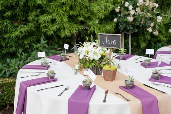 Table decorations for purple and persimmon winter wedding