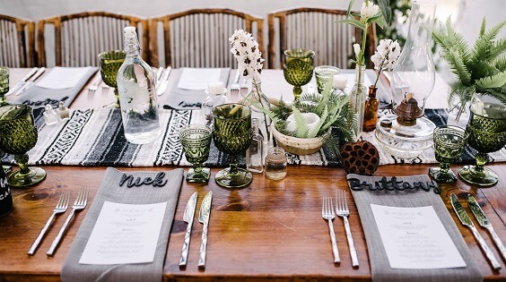 Table decorations for Emerald green and grey winter wedding