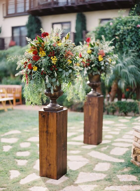 Wedding ceremony decorations for navy blue and burgundy winter wedding