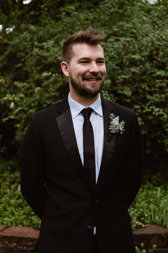 Black groom suit for grey and black winter wedding