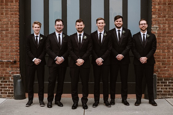 Black suits for grey and black winter wedding