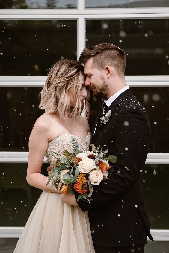 Champagne bridal gown for grey and black winter wedding