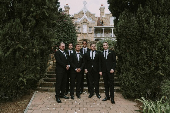 Black suits for Illusion blue and black winter wedding