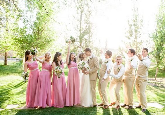 Pink bridesmaid dresses for pink and greenery March wedding